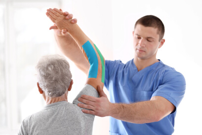 elderly-woman-treated-pt-elbow 1
